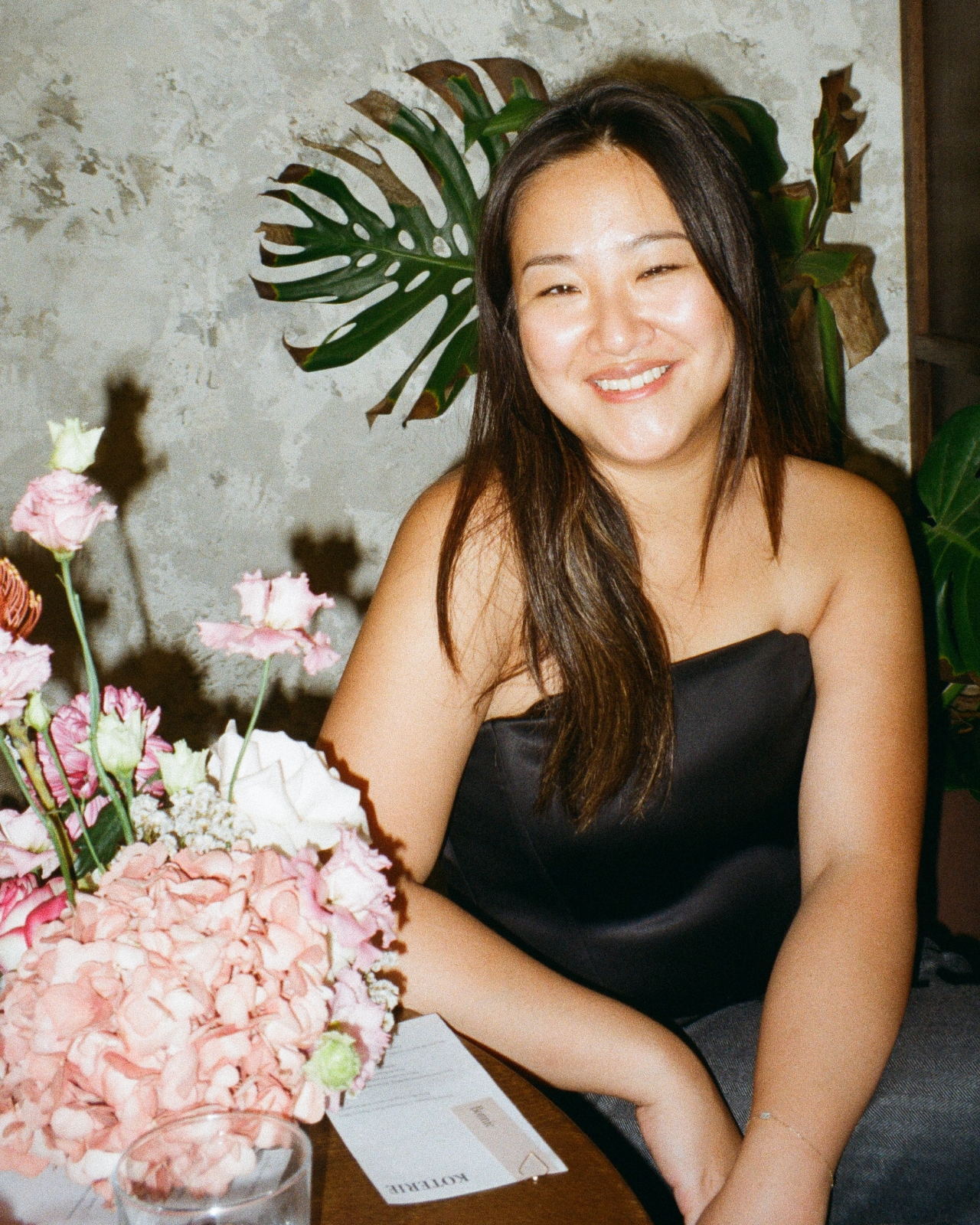 Members laughing together at an event.